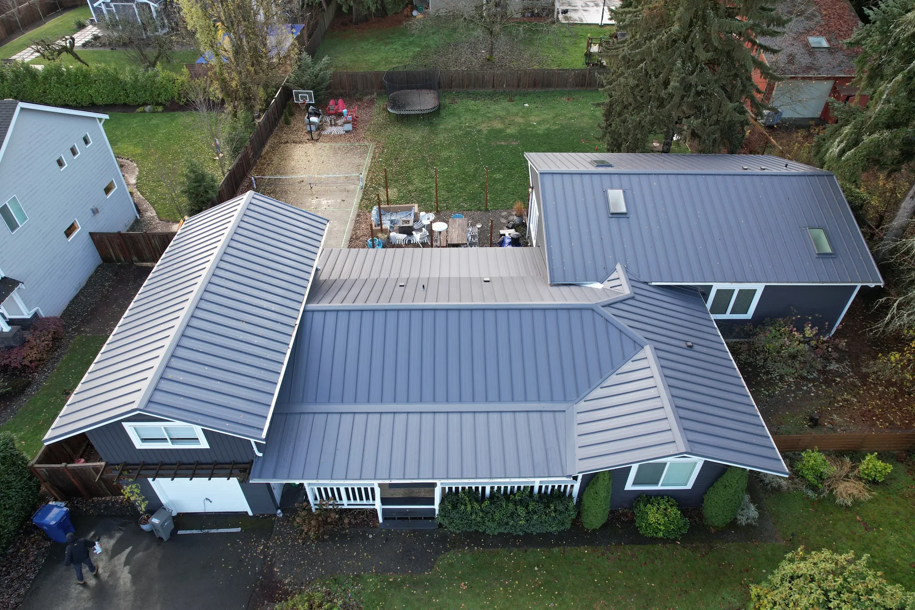 The same home after Titan Roofing installed a new standing-seam metal roof