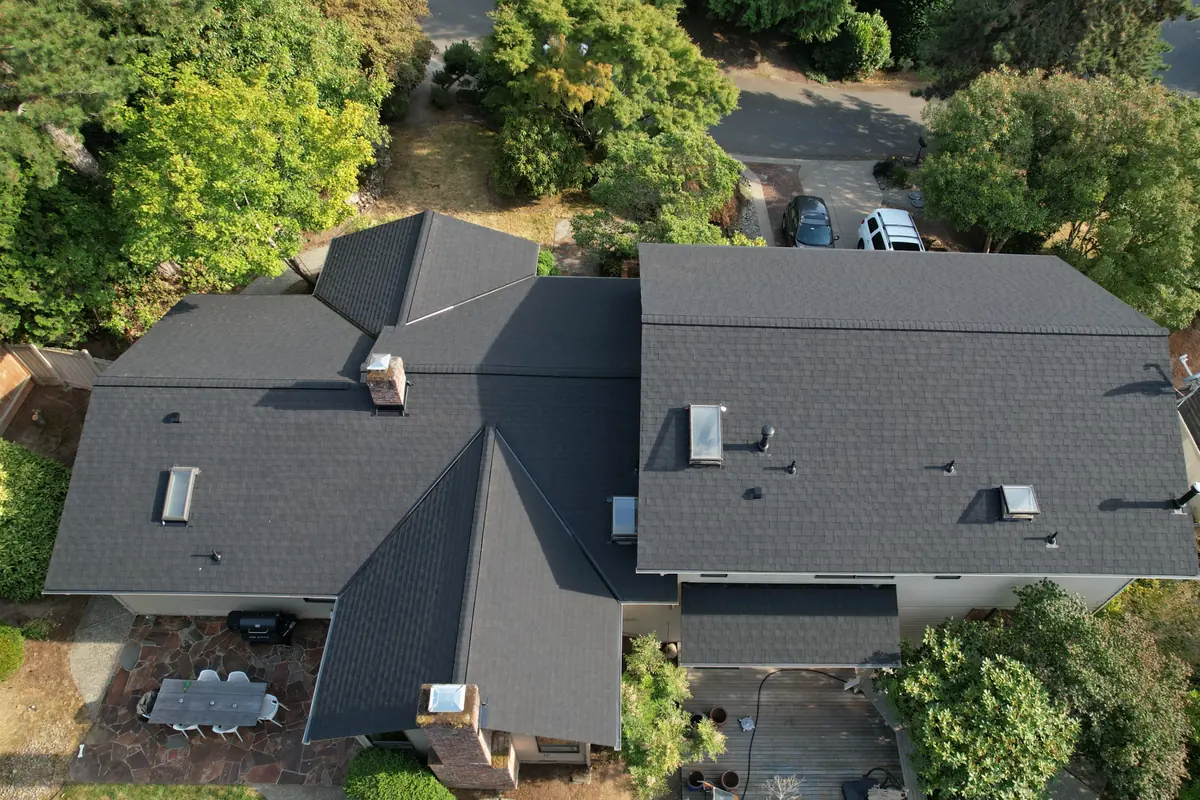 After: Tarped cedar shakes to architectural shingles