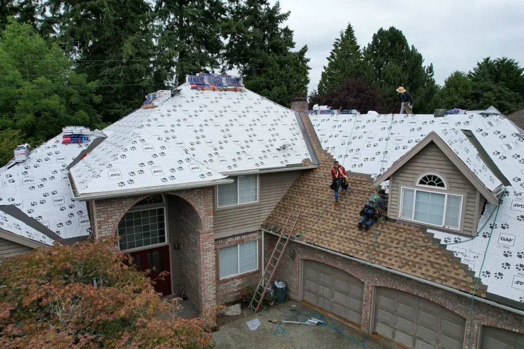 Titan Roofing crew installing a new roof
